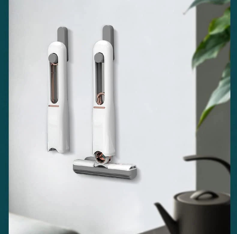 Compact self squeeze cleaning mop with push pull mechanism and hanging design